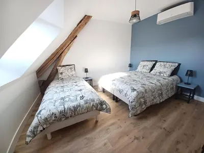 Un ou plusieurs lits dans un hébergement de l'établissement Rêve de Loire chambres d'hôtes au calme au pied des châteaux de la Loire