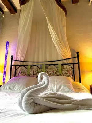 Un ou plusieurs lits dans un hébergement de l'établissement MEUBLE PANORAMIQUE 2 à 6 PERSONNES AU CHÂTEAU DE JALLANGES