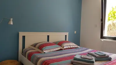 Un ou plusieurs lits dans un hébergement de l'établissement La Chouette d'Amboise