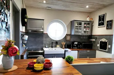 Cuisine ou kitchenette dans l'établissement Votre Escapade au Calme Confort et Sérénité