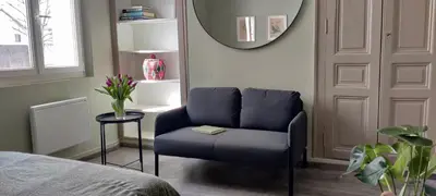 Coin salon dans l'établissement Bel Appartement Calme Tout Confort Entièrement équipé