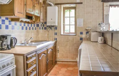 Cuisine ou kitchenette dans l'établissement Murier