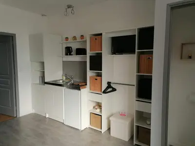 Cuisine ou kitchenette dans l'établissement Charmant F2