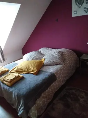 Un ou plusieurs lits dans un hébergement de l'établissement Chambres d'hôtes, 