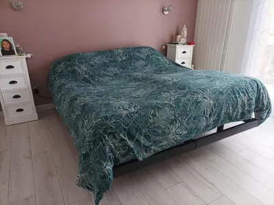 Un ou plusieurs lits dans un hébergement de l'établissement maison d'hotes Dromain