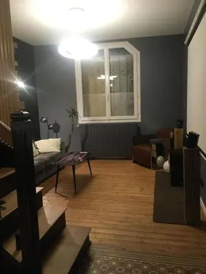 Coin salon dans l'établissement Maison cosy à 2km du circuit bugatti des 24h