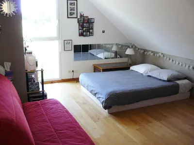 Un ou plusieurs lits dans un hébergement de l'établissement Chambres des 24h00 du Mans