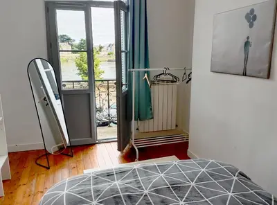 Un ou plusieurs lits dans un hébergement de l'établissement Balcon sur Loire local vélo