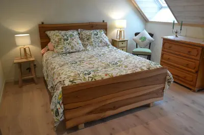 Un ou plusieurs lits dans un hébergement de l'établissement Escale à Villeperdue chambre JÜRMALA