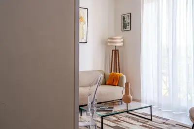 Coin salon dans l'établissement Hyper centre vue bords Loire #confort #luxe