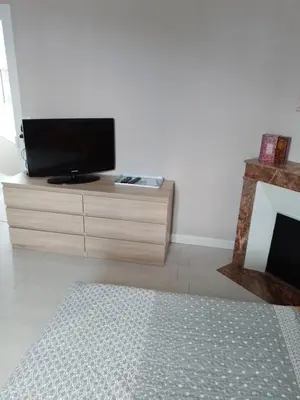 Télévision ou salle de divertissement dans l'établissement Chez patrice
