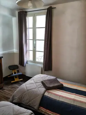 Un ou plusieurs lits dans un hébergement de l'établissement Gîte familial au cœur de Saint-Aignan séjour idéal 3 nuits à 5 min du Zoo de Beauval