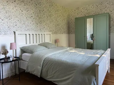 Un ou plusieurs lits dans un hébergement de l'établissement Les chambres de l'atelier