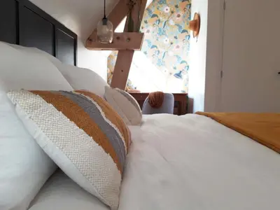 Un ou plusieurs lits dans un hébergement de l'établissement Maison Chemin, chambres d'hôtes à Amboise