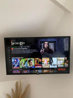 Télévision ou salle de divertissement dans l'établissement Cosy Chambord à 10 minutes du château