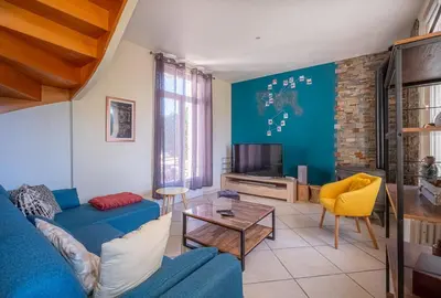 Coin salon dans l'établissement Maison de la Gaîté - Proche gare - Jardin