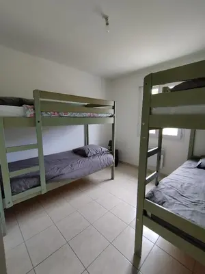 Un ou plusieurs lits dans un hébergement de l'établissement Gîte - Zot Kaz