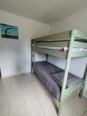 Un ou plusieurs lits dans un hébergement de l'établissement Gîte - Zot Kaz