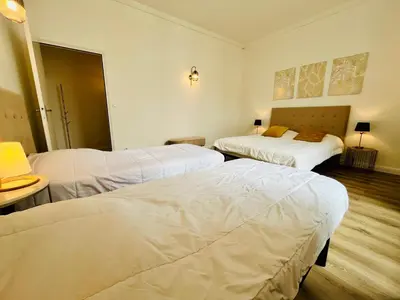Un ou plusieurs lits dans un hébergement de l'établissement Hypercentre, quai de Loire, lumineux, spacieux, familial, le Jehan de Saveuse