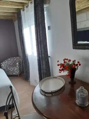 Coin salon dans l'établissement Agréables chambres d'hôtes dans maison XVIIIe
