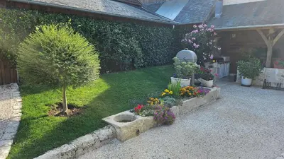 Jardin de l'établissement Agréables chambres d'hôtes dans maison XVIIIe