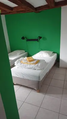 Un ou plusieurs lits dans un hébergement de l'établissement Ma Maison Chambourgeoise