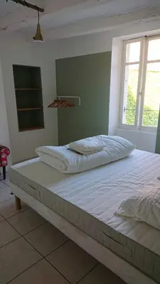 Un ou plusieurs lits dans un hébergement de l'établissement Ma Maison Chambourgeoise