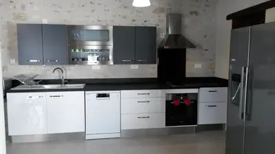 Cuisine ou kitchenette dans l'établissement Gîte Dodo Lé La