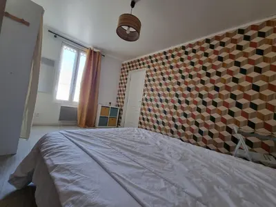 Un ou plusieurs lits dans un hébergement de l'établissement Joli appart. 2 à 8 pers. a 20 min du futuroscope