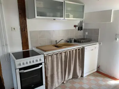 Cuisine ou kitchenette dans l'établissement La Parencelle, proche Boulerie Jump, PEC, Circuit