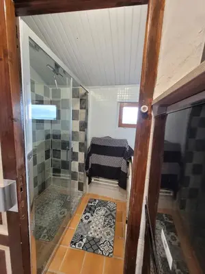 Un ou plusieurs lits dans un hébergement de l'établissement Gîte de Charme proche Loire à Vélo avec Jacuzzi Privatif
