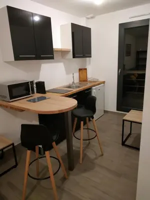 Cuisine ou kitchenette dans l'établissement Pleinitude