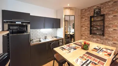 Cuisine ou kitchenette dans l'établissement L'Atelier Flanelle
