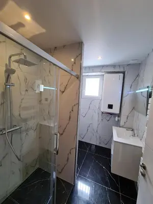 Salle de bains dans l'établissement La roseraie