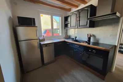 Cuisine ou kitchenette dans l'établissement Les capucines proche Beauval & châteaux