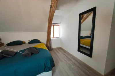 Un ou plusieurs lits dans un hébergement de l'établissement Les capucines proche Beauval & châteaux
