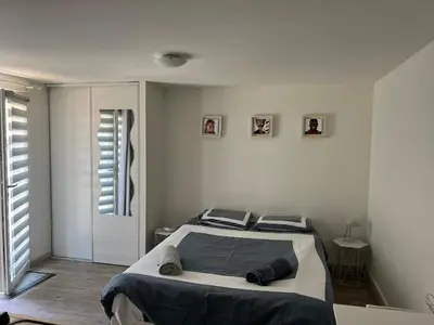Un ou plusieurs lits dans un hébergement de l'établissement Studio calme et indépendant proche Tours