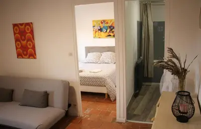 Un ou plusieurs lits dans un hébergement de l'établissement Le Magnolia, chambre d'hôte au calme