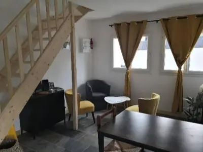 Coin salon dans l'établissement Le Pressoir-Gîte 2-4 personnes