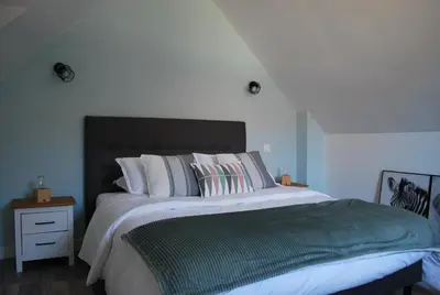 Un ou plusieurs lits dans un hébergement de l'établissement Gîte Abbey Road 41 - Passez vos vacances en toute tranquillité !