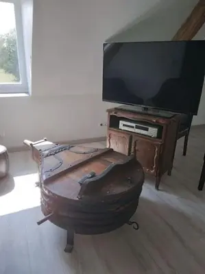 Télévision ou salle de divertissement dans l'établissement Le Manoir à proximité de Tours