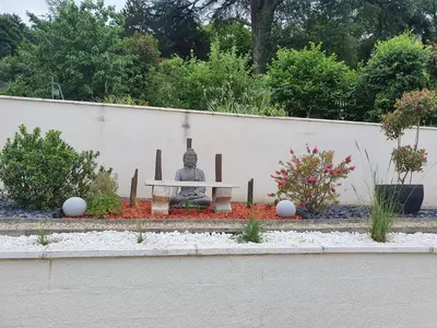 Jardin de l'établissement Chambre Jungle dans maison d'hote 