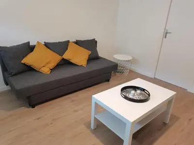Coin salon dans l'établissement Belle Maison 12p 6 couchages TOURS CENTRE avec jardin