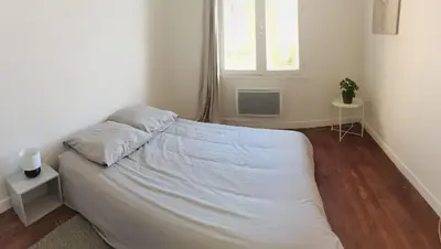 Un ou plusieurs lits dans un hébergement de l'établissement Belle Maison 12p 6 couchages TOURS CENTRE avec jardin