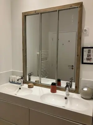 Salle de bains dans l'établissement Le Manoir des Sables - Hébergement familial grand confort