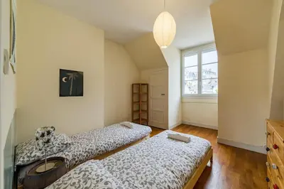 Un ou plusieurs lits dans un hébergement de l'établissement L'Averia - Appartement spacieux en hypercentre