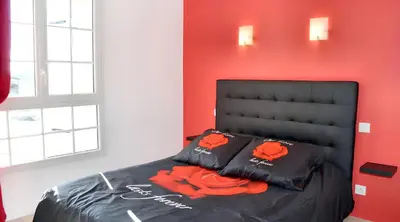 Un ou plusieurs lits dans un hébergement de l'établissement Grande maison accueillante à Saint-Épain avec salle de réception
