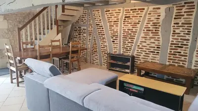 Coin salon dans l'établissement Votre maison en Touraine