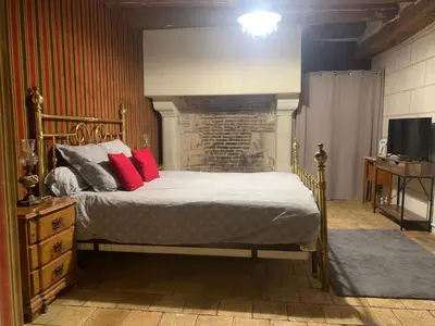 Un ou plusieurs lits dans un hébergement de l'établissement La Grange d Ave