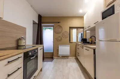 Cuisine ou kitchenette dans l'établissement La Chambrée des Chalands